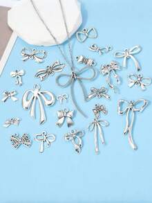 Ciondolo minimalista e carino a fiocco, ciondolo in lega di alluminio a nastro vuoto, ciondolo a fiocco carino in lega vuota per la realizzazione di gioielli fai-da-te, adatto per collane, orecchini, cinturini per telefono, charm per borse, portachiavi, decorazioni per vacanze, gioielli, ideale per regali di San Valentino, Natale, Capodanno