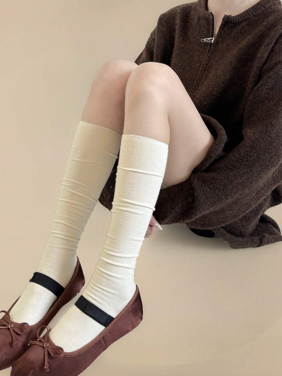 زوج جوارب طويلة سميكة مصنوعة من خليط الصوف