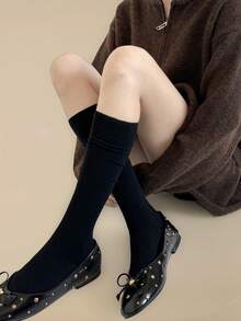 زوج جوارب طويلة سميكة مصنوعة من خليط الصوف