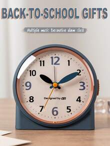 This 4.5-Inch Bedroom Music Alarm Clock Features Silent Operation And A Stylish Design That Easily Blends Into Your Bedroom, Office, Or Dorm Room, Making It The Perfect Addition To Any Space. It Features A Night Light And Snooze Function And Is Powered By Two AA Batteries (Batteries Not Included). - Multicolor - View 2