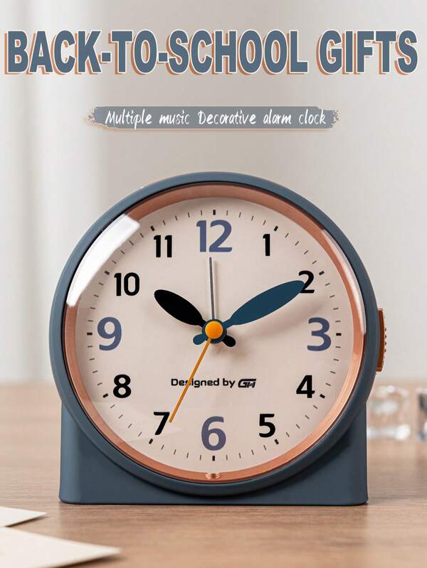 This 4.5-Inch Bedroom Music Alarm Clock Features Silent Operation And A Stylish Design That Easily Blends Into Your Bedroom, Office, Or Dorm Room, Making It The Perfect Addition To Any Space. It Features A Night Light And Snooze Function And Is Powered By Two AA Batteries (Batteries Not Included).