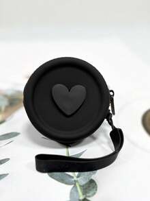 1 pieza Monedero de silicona de estilo simple, bolsa de almacenamiento de gran capacidad y forma redonda, bolsa de color sólido, adecuada para auriculares, cables de datos, lápiz labial, monedas, llaves, etc., tacto suave, fácil de limpiar y cuidar, simple y ligera, espacio razonable, alta portabilidad, adecuada para el hogar, el trabajo, las salidas y los viajes.