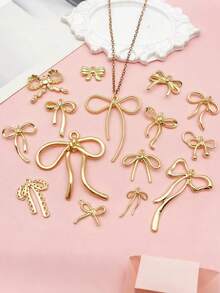 Ciondolo minimalista e carino a fiocco, ciondolo in lega di alluminio a nastro vuoto, ciondolo a fiocco carino in lega vuota per la realizzazione di gioielli fai-da-te, adatto per collane, orecchini, cinturini per telefono, charm per borse, portachiavi, decorazioni per vacanze, gioielli, ideale per regali di San Valentino, Natale, Capodanno