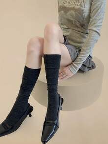 زوج جوارب طويلة سميكة مصنوعة من خليط الصوف