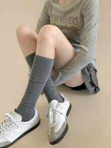 زوج جوارب طويلة سميكة مصنوعة من خليط الصوف
