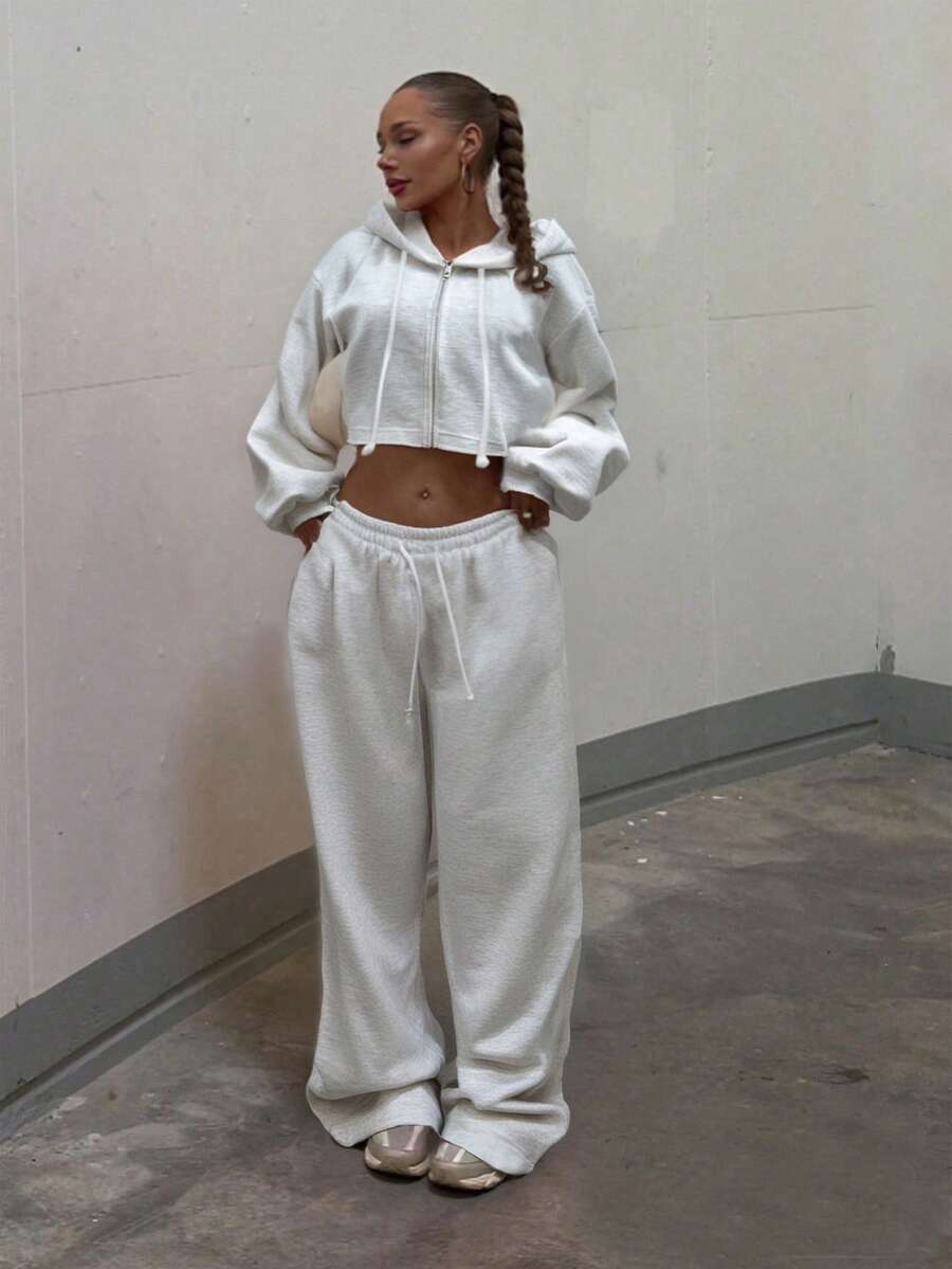 Bộ đồ thể thao nữ gồm áo hoodie và quần dài màu trơn, thích hợp cho mùa Thu/Đông/Xuân. - Xám - Xem 1