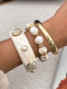 Set de 3 piezas de pulseras de metal con arco geométrico, perlas falsas y conchas, de estilo bohemio. Pulseras elegantes y lujosas para uso diario, casual o de fiesta, como regalo de joyería para mujeres.