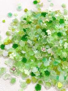 50g/Bolsa (500-600 piezas) Encantos de uñas de colores surtidos 3D en formas de corazón, flor, mariposa y lazo de resina con piedras de colores para manualidades de manicura y joyería