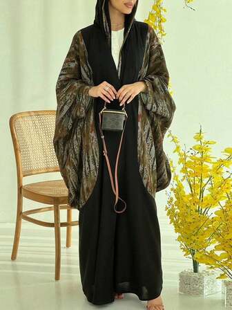 优雅长袖 Kaftan Abaya 连衣裙，采用略有弹性的机织面料制成，袖子图案精美，含头巾