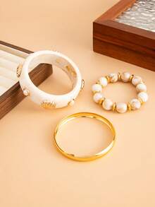 Set de 3 piezas de pulseras de metal con arco geométrico, perlas falsas y conchas, de estilo bohemio. Pulseras elegantes y lujosas para uso diario, casual o de fiesta, como regalo de joyería para mujeres.
