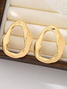 1 par de pendientes asimétricos de oro metálico