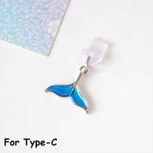1 pieza Tapón antipolvo para smartphone con diseño de cola de sirena azul, accesorio creativo y elegante con colgante de metal de aleación con diseño de cola de sirena o ballena de la serie oceánica, tapón de silicona transparente para teléfono, auriculares, tableta, Kindle, decoración para puerto de carga del teléfono