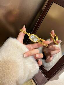 1 pieza Reloj de cuarzo elegante de moda con esfera minimalista y caja con diamantes de imitación, adecuado para decoración diaria - Dorado - Ver 2