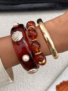 Set de 3 piezas de pulseras de metal con arco geométrico, perlas falsas y conchas, de estilo bohemio. Pulseras elegantes y lujosas para uso diario, casual o de fiesta, como regalo de joyería para mujeres.