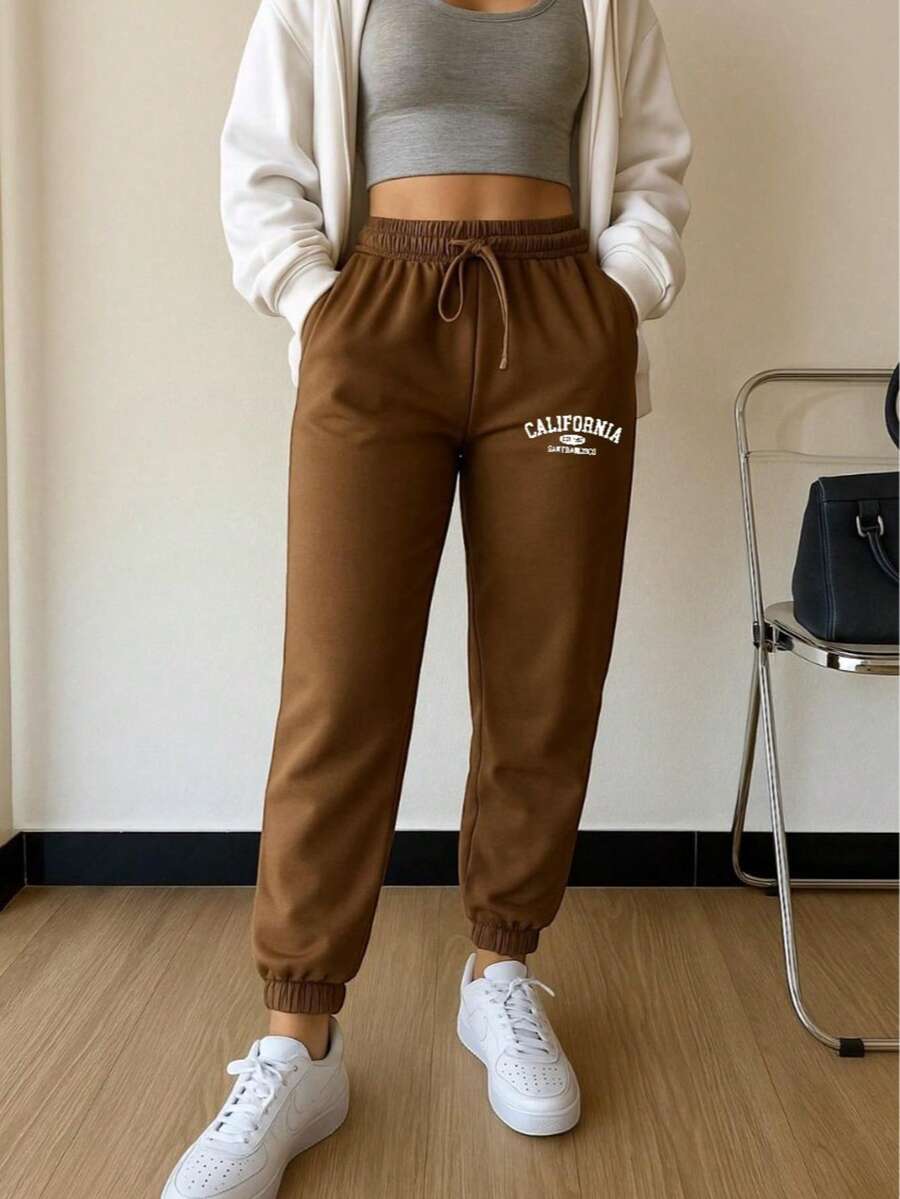 jogger mujer pants deportivos dama conjunto deportivo gris pantalón con puño en el tobillo ropa cómoda para gimnasio outfit casual femenino look deportivo urbano - Camel - Ver 1