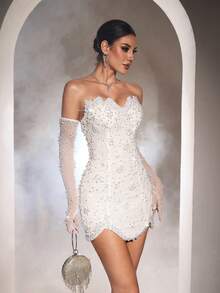 Đầm cưới Astony One màu trắng thanh lịch với điểm nhấn ngọc trai giả sang trọng, thiết kế cúp ngực gợi cảm, vạt áo bất đối xứng ôm sát, kết hợp với tay áo trắng, tôn lên vóc dáng duyên dáng. Hoàn hảo cho đám cưới, lễ đính hôn, tiệc sinh nhật, tiệc cưới, lễ hội, dã ngoại, lễ hội âm nhạc, dạ hội trang trọng và các sự kiện thảm đỏ. Tiệc mùa xuân - trắng - Xem 8