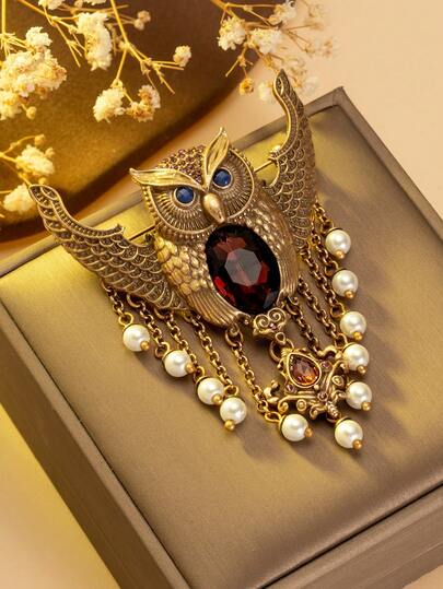 1pc Vintage Owl Brooch, Gold Wings Decorated With Red Gemstone & Pearl Tassel, Blue Sapphire Eyes, 5.9cm X 8.2cm Size, 30.4g Weight, Elegant Vintage Accent For Coats Or Artistic Outfits