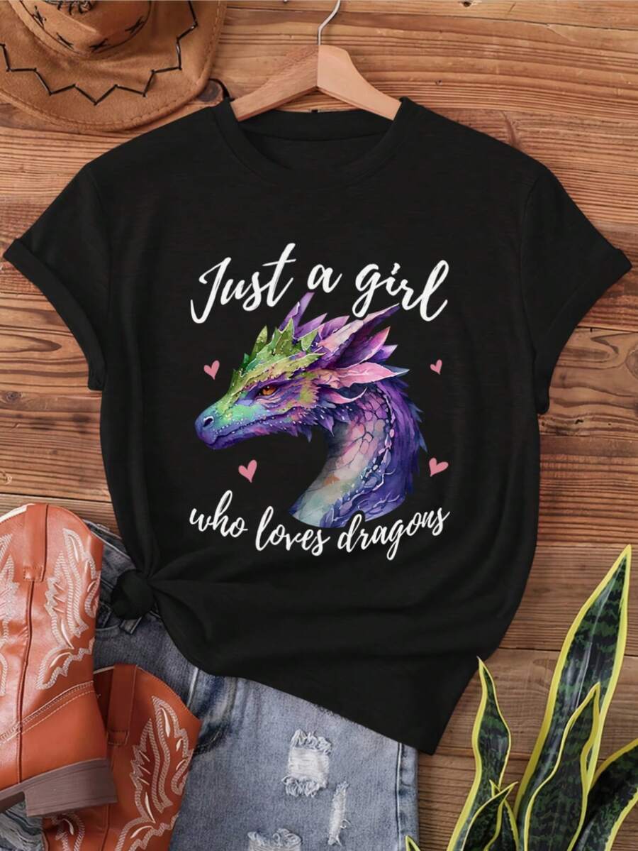 Women's Cute Dragon Watercolor Art Print T-Shirt - Purple Dragon & Pink Hearts Design With Just A Who Loves Dragons Quote, Soft Stretchy Semi-Sheer Fabric, Short Sleeve Crew Neck Casual Top For Summer & Spring, Casual Attire, Machine Washable Shirt - màu đen - Xem 1