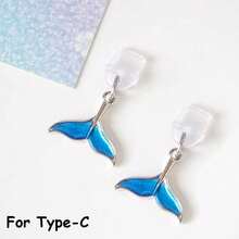 1 pieza Tapón antipolvo para smartphone con diseño de cola de sirena azul, accesorio creativo y elegante con colgante de metal de aleación con diseño de cola de sirena o ballena de la serie oceánica, tapón de silicona transparente para teléfono, auriculares, tableta, Kindle, decoración para puerto de carga del teléfono