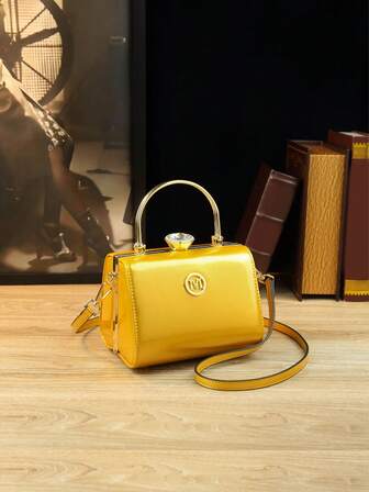 新款亮黄色女士手提包，采用水钻镶嵌设计和金属背环单肩包，适合宴会和派对的多功能女士包