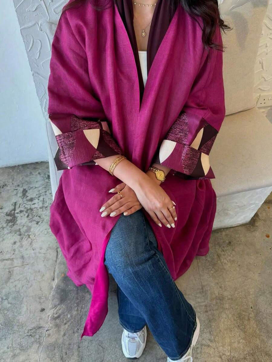 这款女士优雅经典纯色椭圆形印花拼接袖口长袍，尽显优雅精致的风格，适合所有季节和各种文化活动。它既是女士服装，也是优雅精致的长袍，同时也是一件时尚复古的阿拉伯服饰。这款时尚优雅的开襟长袍适合日常和正式场合穿着，四季皆宜，可用于各种场合，例如派对、假期和春季旅行。 - 玫紅色 - 查看 1