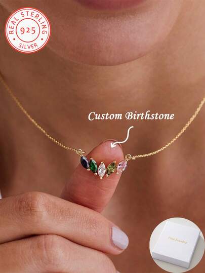 Ett specialdesignat halsband i 925 sterlingsilver med olivformad födelsesten. Ett personligt och utsökt smycke. Anpassat halsband med födelsesten. Familjepresent, jubileumspresent, födelsedagspresent, minnesglimt, examenspresent, julklapp, en omtänksam present till henne.