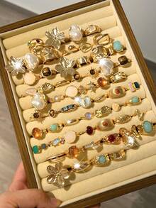 20/6pcs Vintage Delicate Bohemian Minimalist Style Gold Stackable Rings Set, Includes Flower, Bow, Asymmetrical Pearl, Twist, Heart, Rhinestone, Moon, Star, Cross, Cat Eye Stone Designs, Suitable For Women, Holidays, Parties, Dates, Daily Wear, Gift (Random Assortment) - Gold - View 1