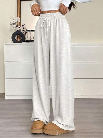 Pantalones anchos de cintura media con cordón gris, pantalones casuales de moda para uso diario y en casa que estilizan la figura