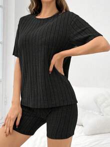 Conjunto de pijama para mujer de top de cuello de tripulación de manga corta y pantalones cortos sueltos de unicolor con acabado cepillado y acanalado - Negro - Ver 4