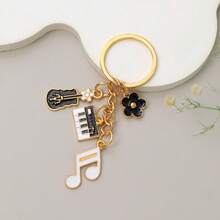 1个珐琅钢琴吉他音符钥匙扣、包包挂饰、USB吊坠，音乐艺术学生礼物，可作包包挂饰、汽车挂饰、老师礼物、朋友礼物、姐妹礼物