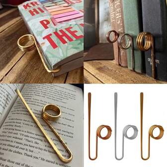 1ชิ้น ที่คั่นหนังสือโลหะสร้างสรรค์ แหวน ที่คั่นหนังสือ น้ำหนักเบา ที่คั่นหน้าหนังสือแบบนิ้วหัวแม่มือ ที่เปิดหนังสือแบบวงแหวนนิ้วแบบพกพา