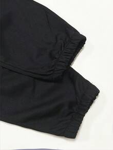 1 chiếc quần cargo nữ dáng rộng có túi nắp và dây rút bên hông, quần dài màu trơn phong cách thường ngày, thích hợp cho mùa xuân, hè, thu và đông. - màu đen - Xem 10