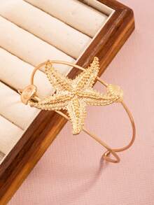 O coajă elegantă și la modă, cu strat dublu, în formă de stea de mare, cu deschidere reglabilă pentru brățară de damă