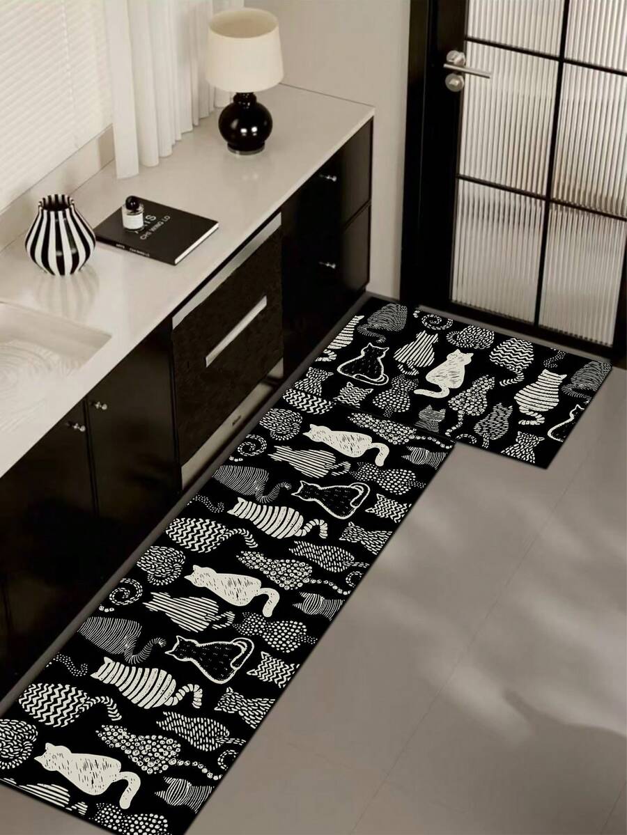 1 件硅胶厨房垫，卡通动物与抽象图案组合。垫子以黑色为底，印有多个白色猫咪图案，并搭配圆点、条纹、波浪等不同纹理的抽象图案，整体呈现可爱又不失艺术感的风格。 - 彩色 - 查看 1