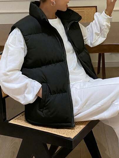 1件青少年女孩休闲户外多功能保暖加厚立领背心，适合春、秋、冬季穿着。