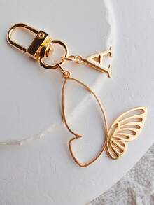 Elegant Alloy Butterfly And 26 English Letters Gold Keychain, A-Z Letters Fashionable Hollow Butterfly Design, Exquisite Bag Pendant, Pendant, Suitable For Bag Pendant Car Accessories, Perfect Women'S Daily Wear And Friends' Birthday Gifts, Daily Necessities, Perfect Holidays, Birthdays, Thanksgiving, Christmas Gifts