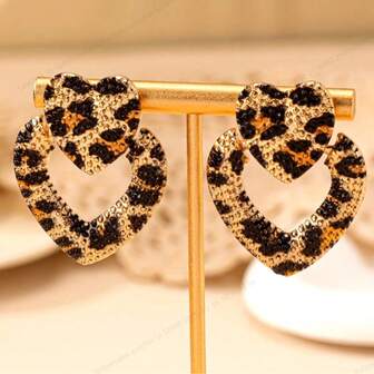 1 par de pendientes con corazón hueco, estampado de leopardo exagerado y cristales de moda