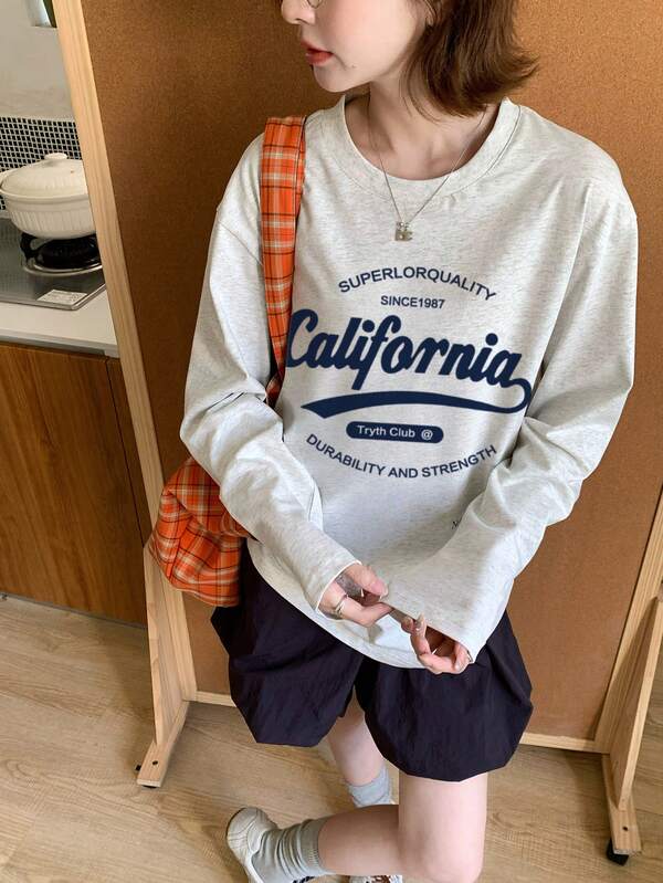 Camiseta Feminina Casual de Manga Longa com Gola Redonda, Estampa de Letra Oversized e Fofa, Versátil para Outono/Inverno