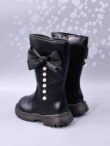 Botas para niñas para otoño/invierno, nuevos estilos de botas altas para niños, botas de princesa de cuero con suela gruesa, lazo y perlas para niños de talla media, zapatos escolares, botas altas con cremallera lateral para niñas