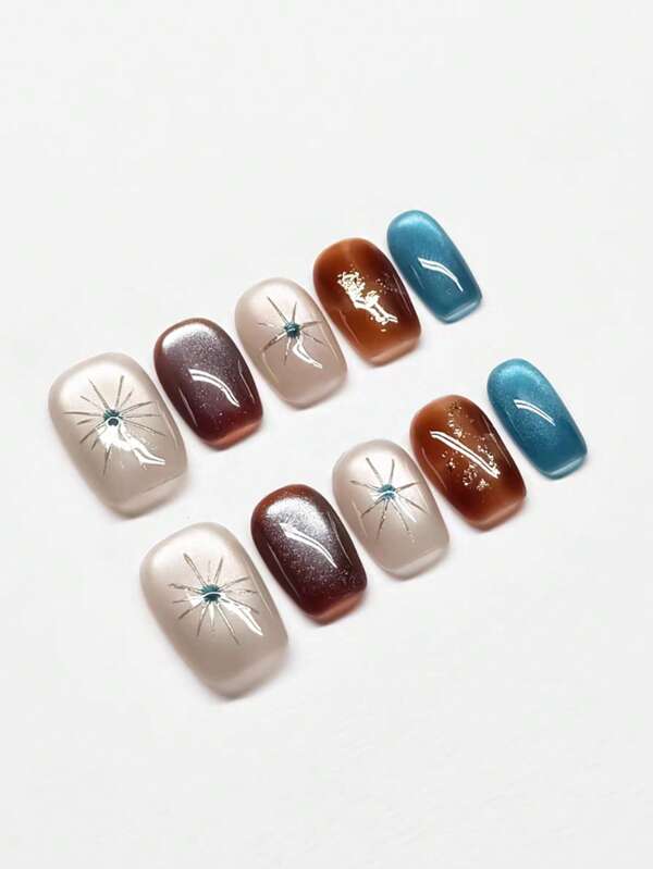 10 pièces/set d'autocollants pour ongles haute gamme faits à la main dans les couleurs bleu, blanc, marron, argent et étoile. Nouveaux ongles courts et élégants convenant pour les fêtes, les danses et le port quotidien, et peuvent être réutilisés. Il y a 4 tailles au choix, convenant aux filles/femmes, aux représentations sur scène, aux festivals, aux fêtes, aux mariages, au port quotidien et aux cadeaux préférés