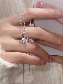 Nooxian 1 chiếc dây chuyền mặt nơ đính đá Cubic Zirconia lấp lánh bằng đồng dành cho nữ - Bạc - Xem 4