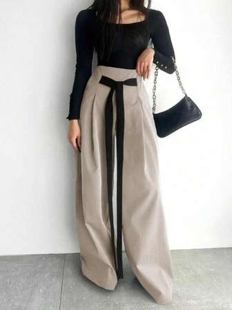 Plusstorlekar dambyxor med eleganta, vändbara vardagsbyxor och kontrastfärg, rosett