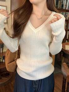 Top con cuello en V de punto acanalado, ajuste ceñido y elástico de manga larga versátil para usar en primavera - Albaricoque - Ver 5