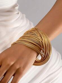 3 Sizes Available: 30pcs/Set, 50pcs/Set, 77pcs/Set Matte Gold Tone Coil Bangle Bracelet, Designed For Women, Suitable For Party, Holiday, Jewelry Accessory (Note: The 50pcs Set Is Shown In The Main Image, The 77pcs Set Has A Better Wearing Effect, The 30pcs Set Has Slightly Different Wearing Effect, And The Product Color May Vary Slightly Under Different Lighting Conditions, Suitable For Different Wrist Sizes)