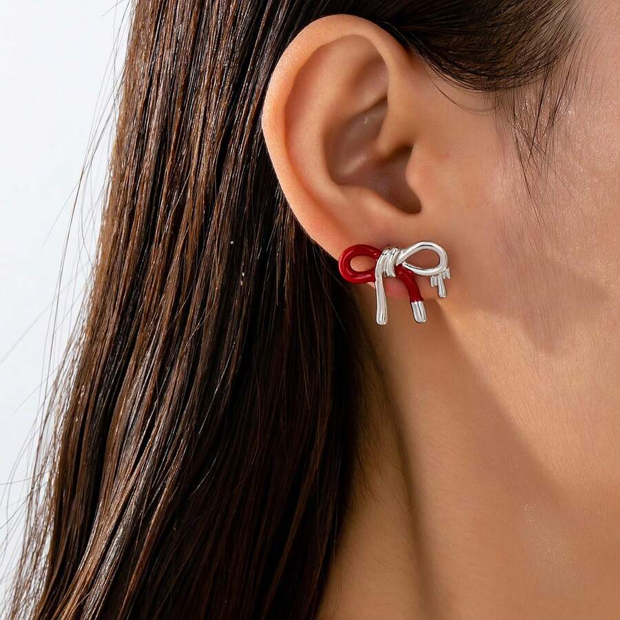 1 par de pendientes de mariposa elegantes de contraste plateado y rojo