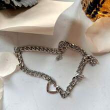 1 pieza Collar de cadena cubana de estilo vintage plateado con colgante de corazón hueco, delicado y único