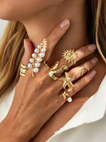 Set de 7 anillos con formas geométricas asimétricas, perlas falsas, estrellas de mar y soles, de estilo ligero y lujoso, para moda casual, estilo callejero, vacaciones, bodas, citas, cumpleaños de mujer, festividades, un regalo de joyería versátil