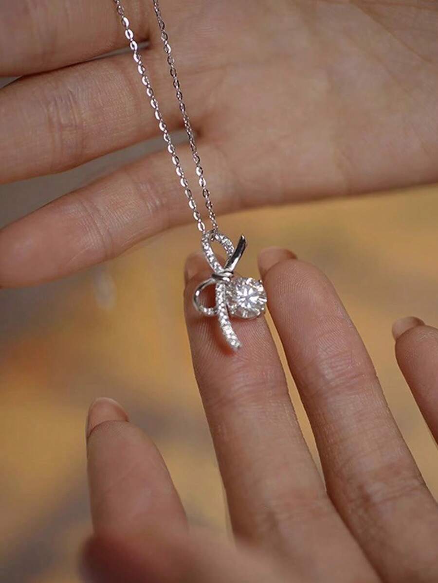 Nooxian 1 chiếc dây chuyền mặt nơ đính đá Cubic Zirconia lấp lánh bằng đồng dành cho nữ - Bạc - Xem 1