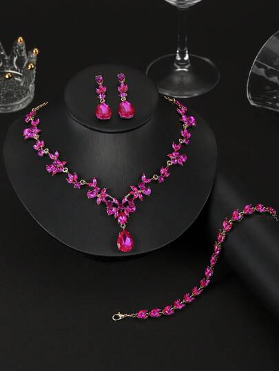 Un conjunto de 4 piezas de joyería elegante y de moda de aleación con cristales de rhinestone y vidrio, que incluye collar, aretes y pulsera, adecuado para bodas, banquetes, bailes y fiestas de mujeres