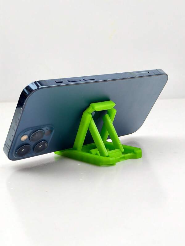 Support de téléphone portable avec porte-clés - Ne perdez plus jamais votre support ! Assez robuste pour les téléphones de 6,7 pouces (ne bascule pas lors de la frappe), attrapez-le à vos clés pour un streaming mains libres, la cuisine ou le vlogging. Choix de couleurs aléatoires (pastels/néons/classiques) - Cadeau de Noël/faveur de fête parfait pour répandre la joie des fêtes auprès de vos amis et de votre famille. Léger, tient dans les poches/sacs - Utilisez-le partout